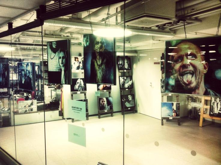 The facade of Laakso's "Gods, Heroes and Fragile Stars" photo exhibition. Kauppakeskus Apaja, Kuopio, Finland.